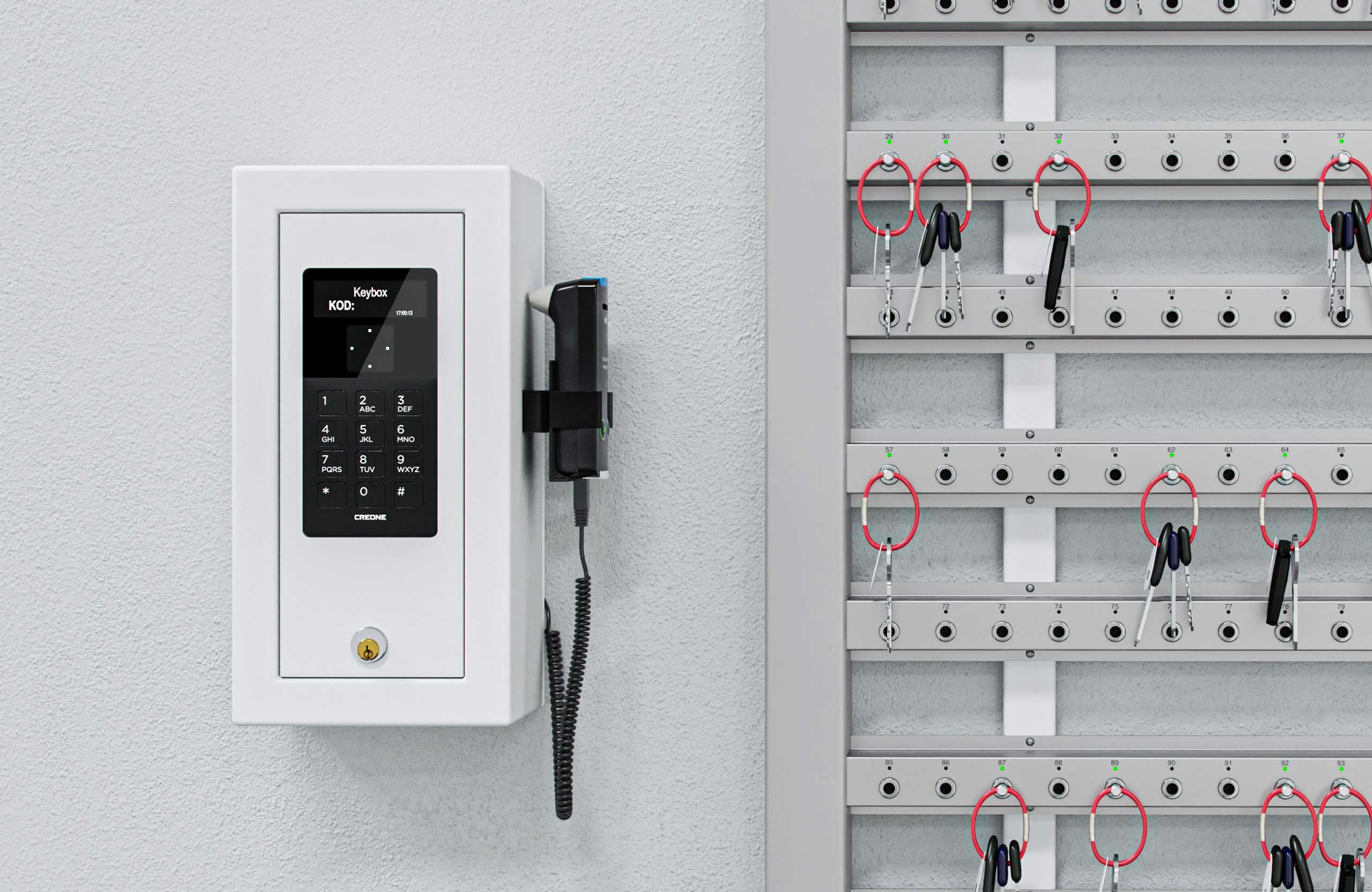 Intelligent key strips with control box mounted on the wall for a unique key management solution.